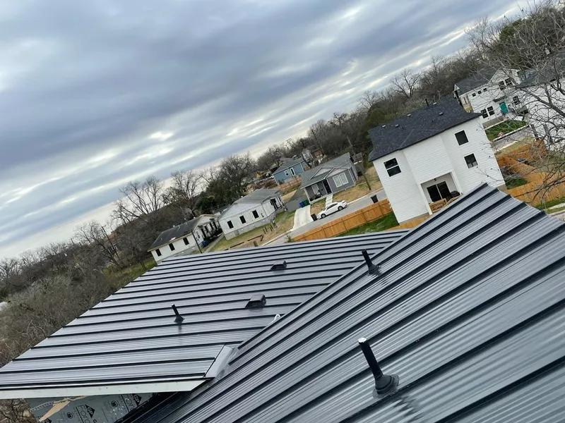 Standing seam metal roof panels with vents for Skylight Repair in Southington